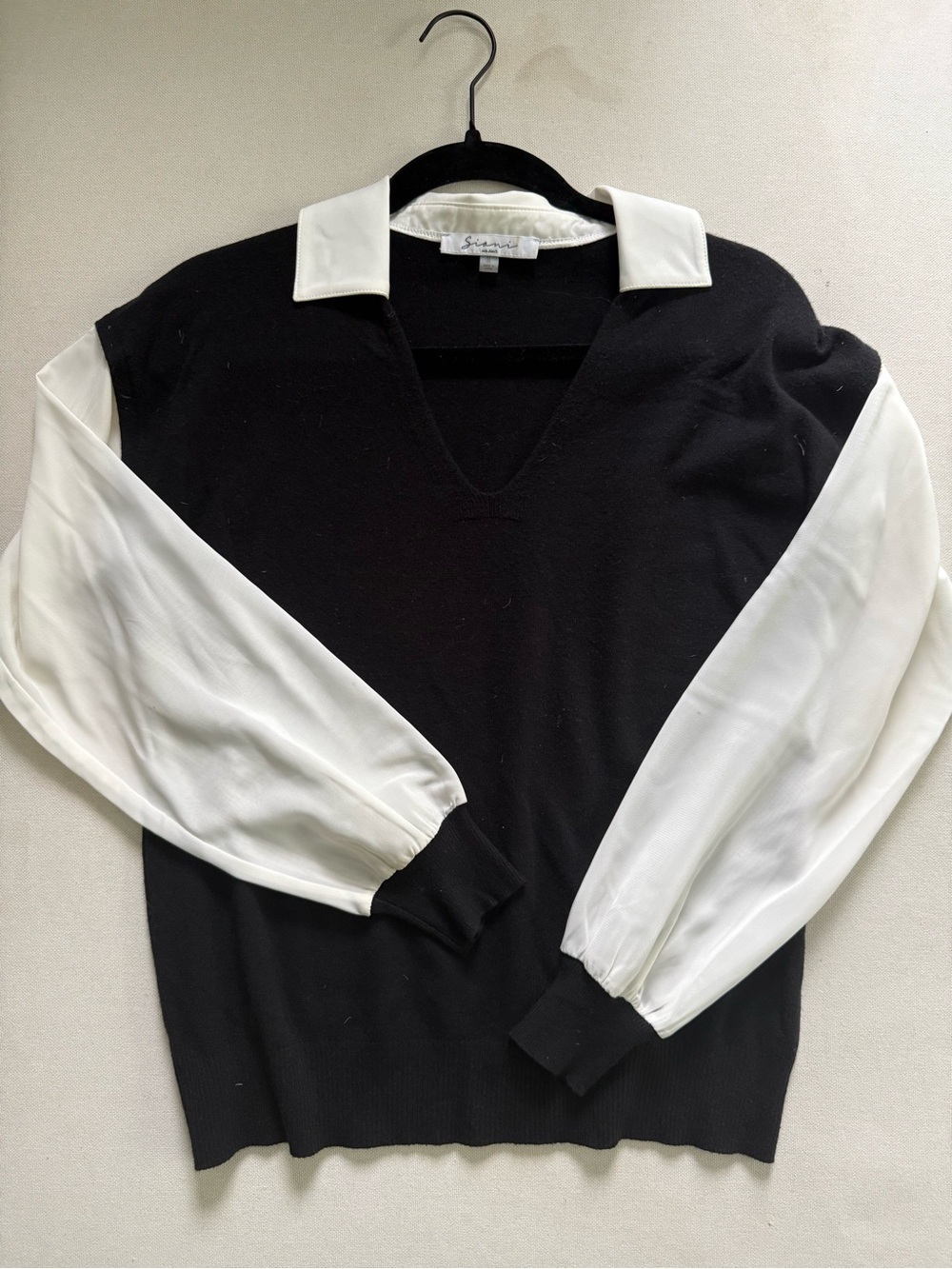 Sioni Black V-Neck Sweater with White Shirt-Style Sleeves and Collar